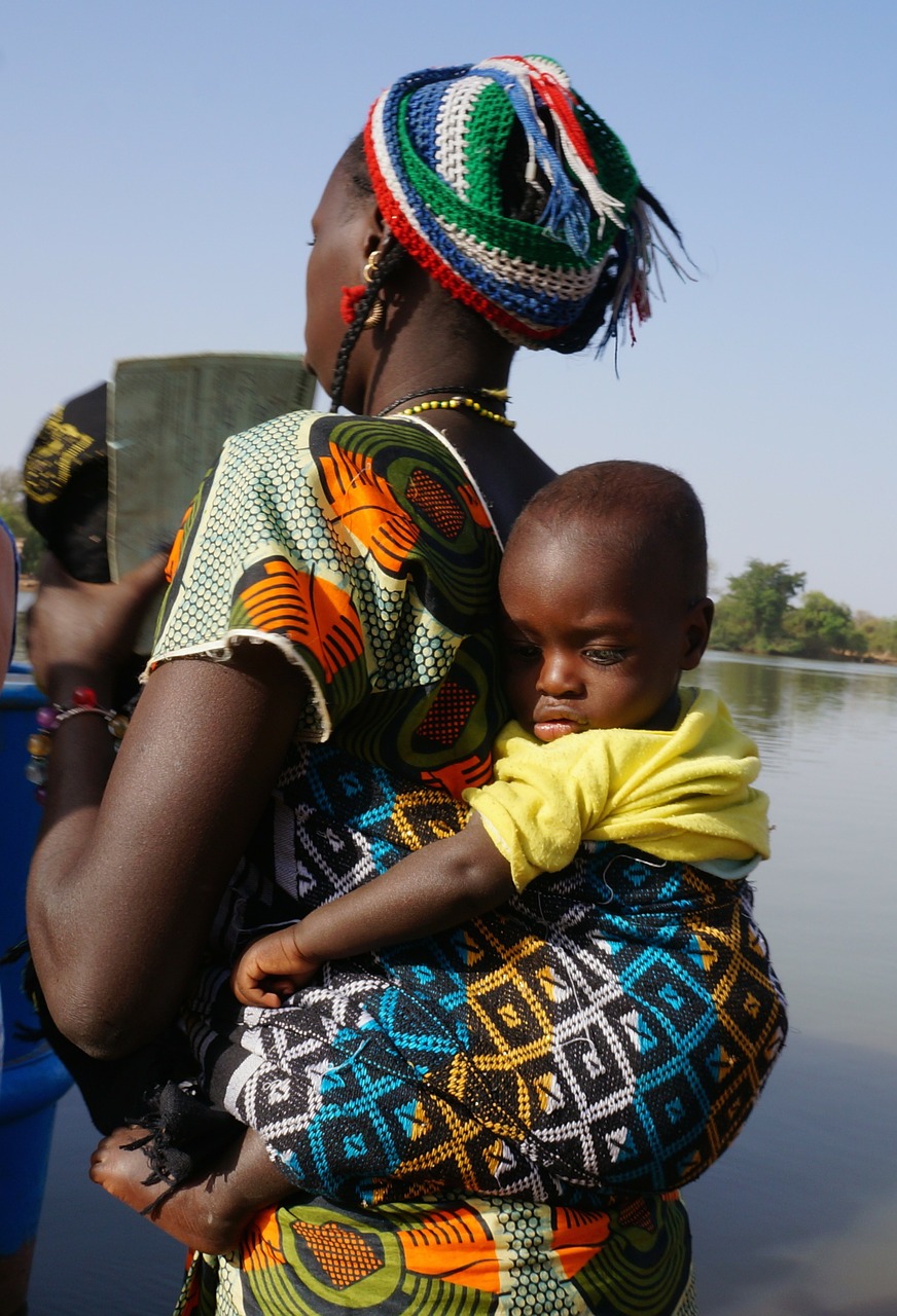 Woman carrying baby