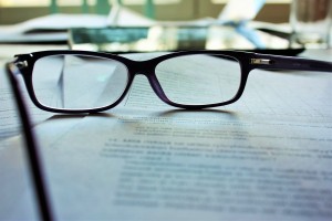 glasses on a manuscript