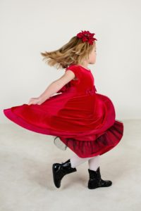 Girl in red velvet dress