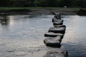 stepping stones across a river