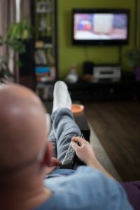 man watching television